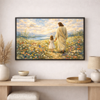 Framed artwork of jesus and a child walking in a field with flowers on a wall above a wooden console table.