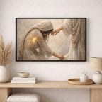 Framed artwork of a religious scene on a wall above a wooden console table with decor items.