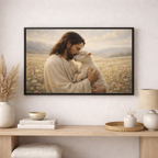 Framed artwork of a man hugging a lamb in a field, displayed on a wall above a wooden console table.
