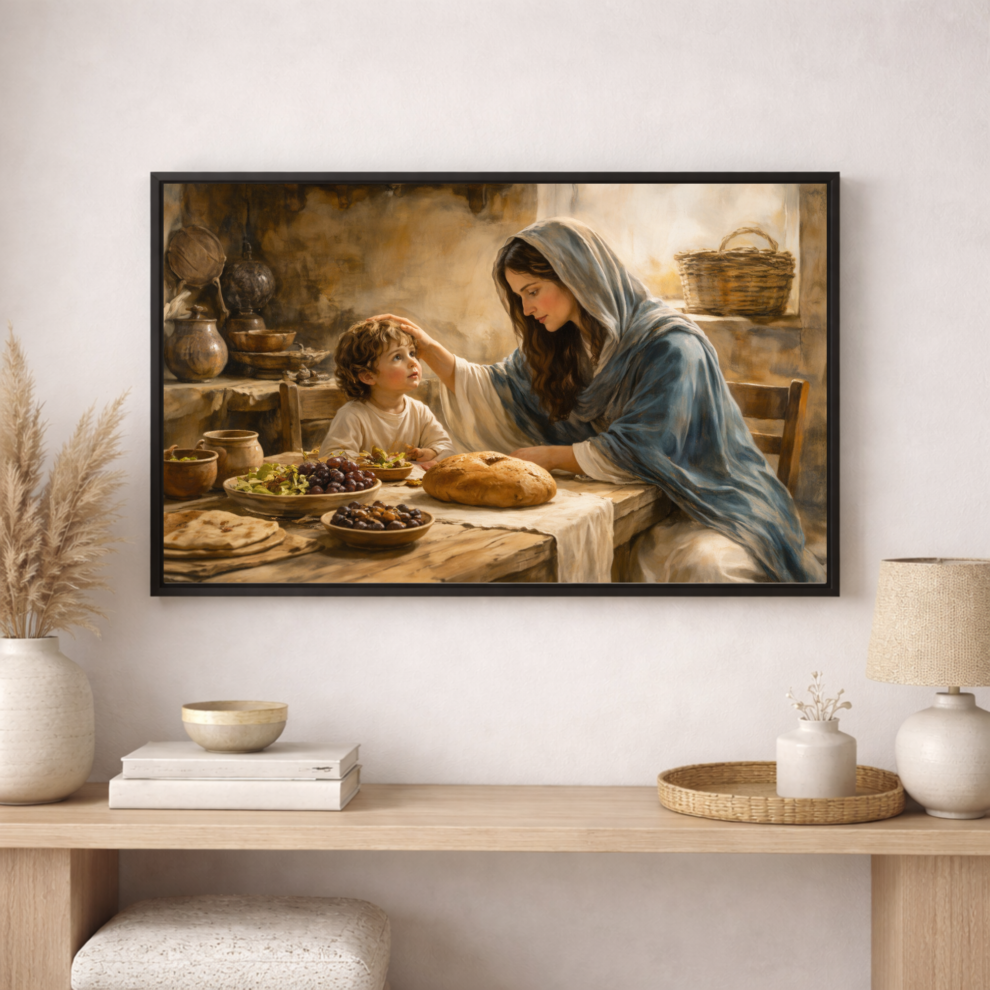 Framed artwork of Mary and child at a table with food, displayed on a wall above a wooden console table.