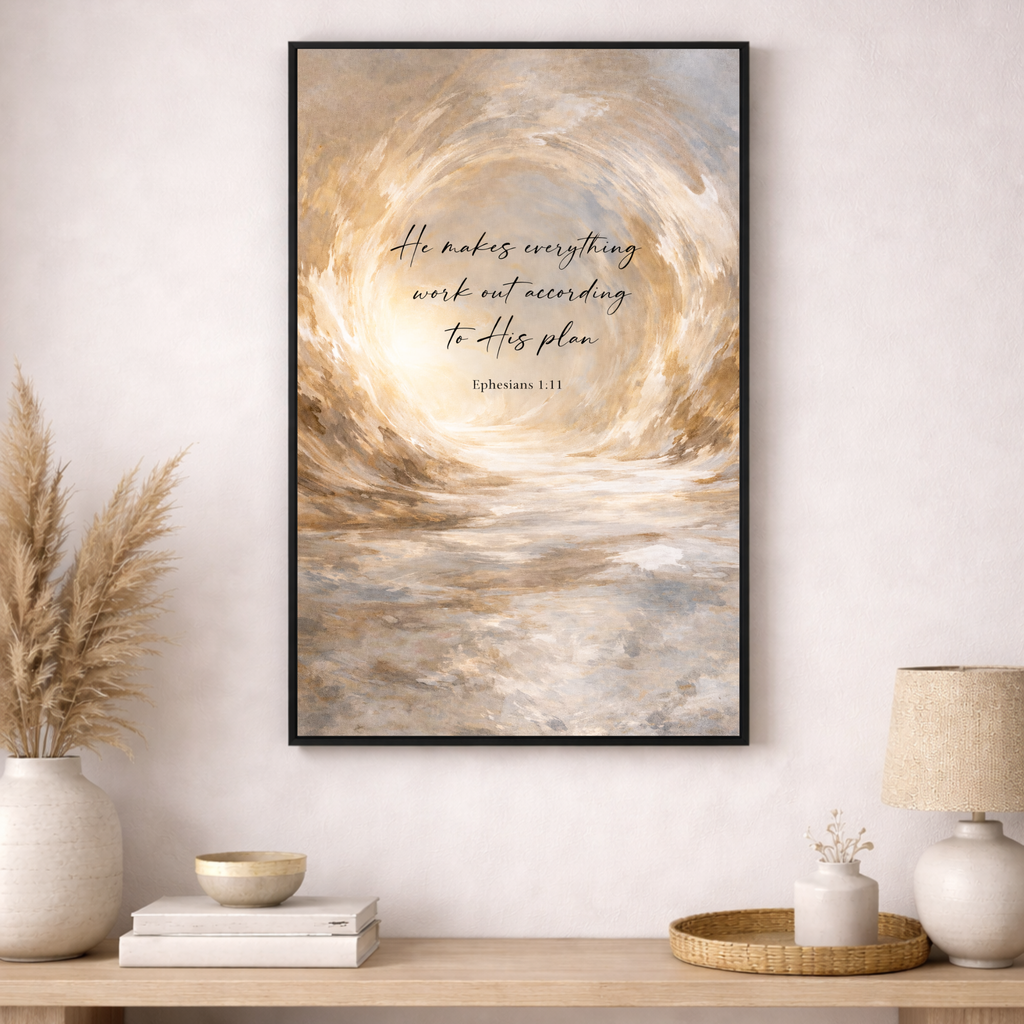 Framed abstract artwork with text on a wall above a wooden console table.